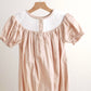 Khaki he is risen hand-smocked girl bubble